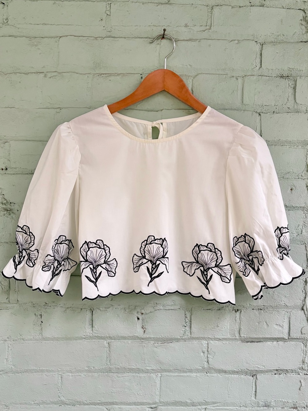 Floral Embroidered Cropped Puff Sleeve Blouse in White with Black Embroidery